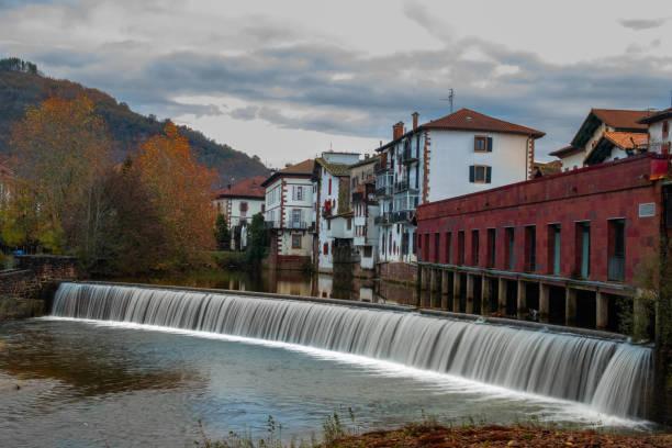 istock Autumnal trees frame Elizondo reservoir scene. 1810339488