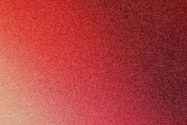istock gradient red color glitter paper abstract, grunge texture background, retro styled concept 1810368785