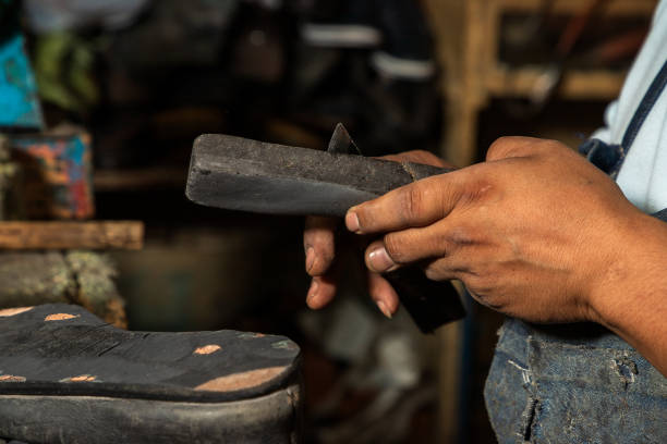 istock Detail Mexican shoemaker sharpening knife 1810381746