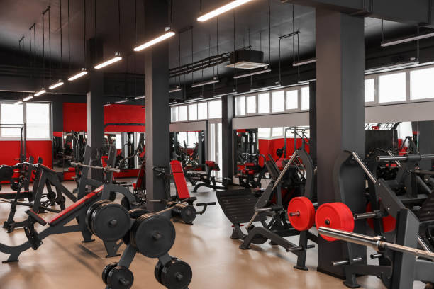 istock Spacious gym with professional equipment and mirrors 1810393148