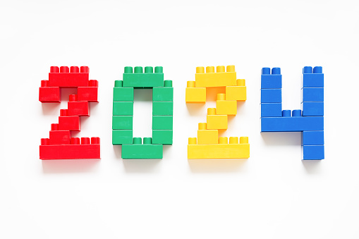 Playful Learning: Kid-Friendly New Year's Prep with 2024. Educational toys for kids. Education. Happy New Year and Merry Christmas.