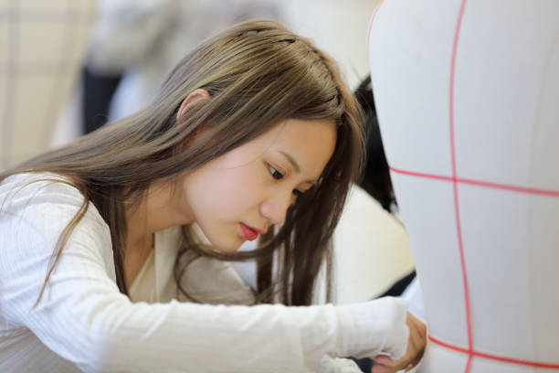 istock A young fashion designer is making pattern 1810438179