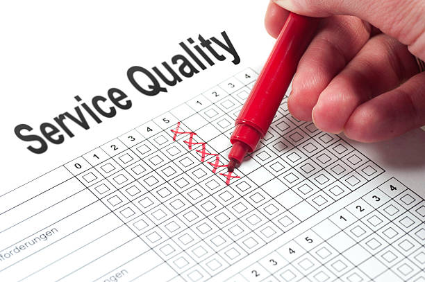 Service Quality survey customer satisfaction paper with human hand and red pen umfrage stock pictures, royalty-free photos & images