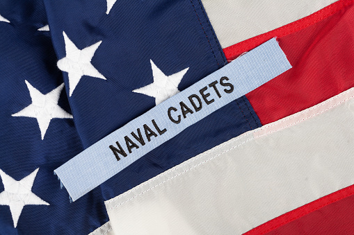 U.S. Naval Cadets Branch Tape on national USA flag background