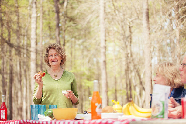 istock seniors enjoying a cookout 181045947