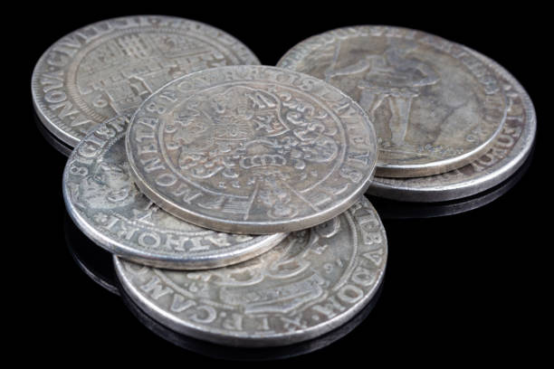 istock Stack of old vintage silver medieval taller coins 1810462791