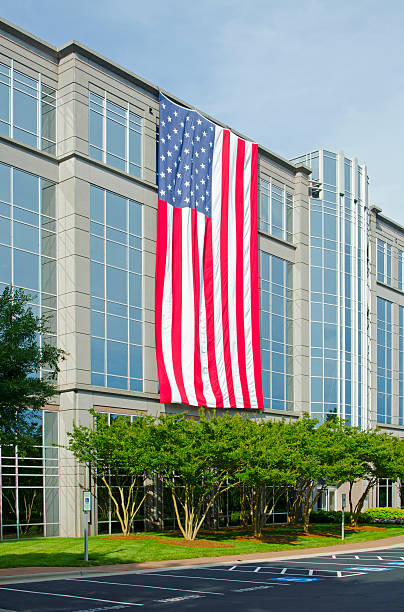 istock An office building is patriotic with a large American flag. 181046318