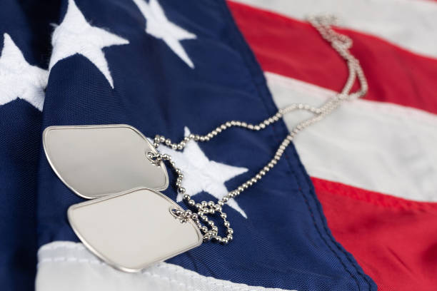 istock US army dog tags on USA national flag 1810464018