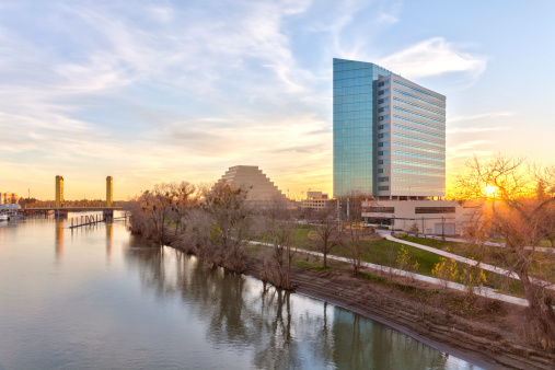 The Tower Bridge, the Sacramento River, and buildings in West Sacramento at sunset (HDR).