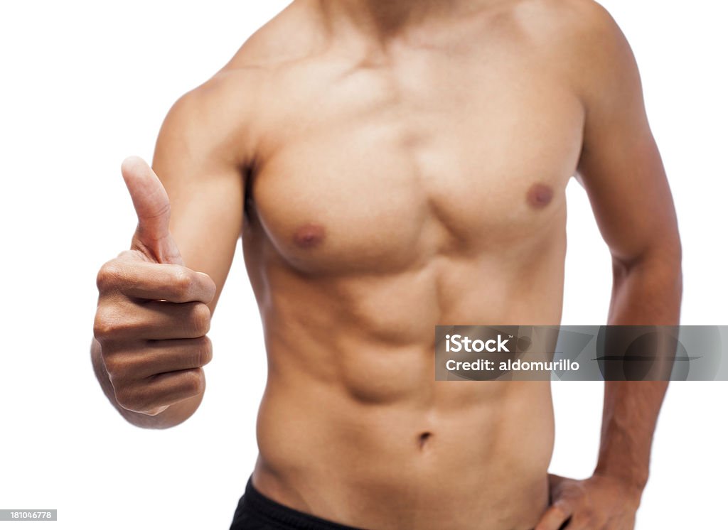 Musculoso homem fazendo os polegares para cima - Foto de stock de 20 Anos royalty-free