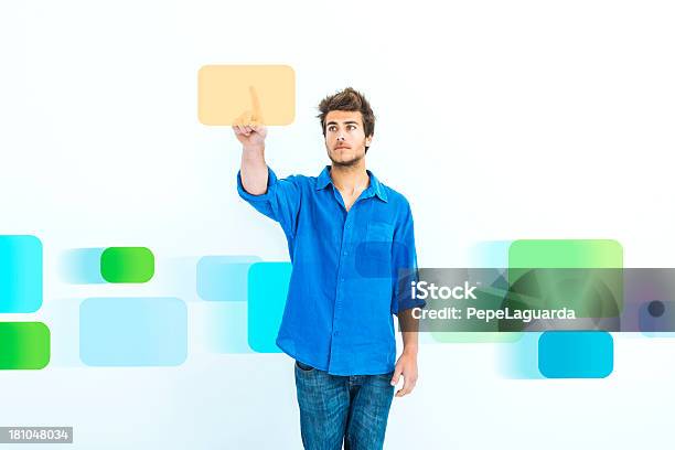 Man Choosing Virtual Files Stock Photo - Download Image Now - 20-24 Years, Accessibility, Adult