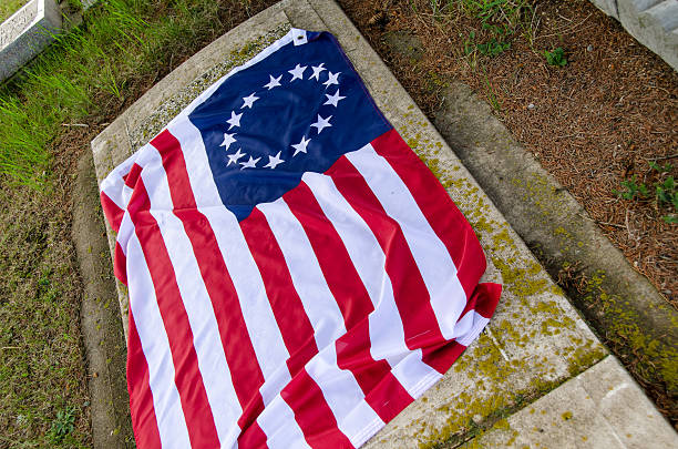 istock United States Flag and Grave 181048156
