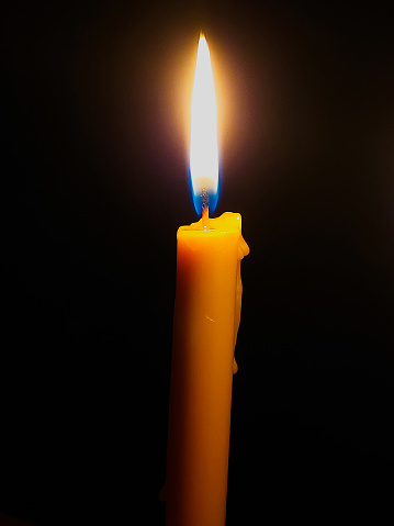 Holding a candle lit at both ends, illustrating the saying \
