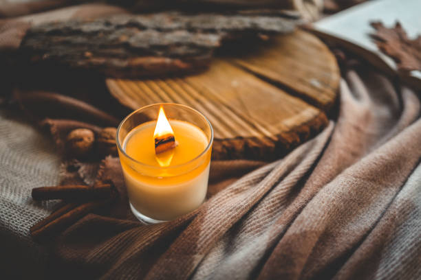 istock Burning candle in home interior, autumn aesthetics 1810484164
