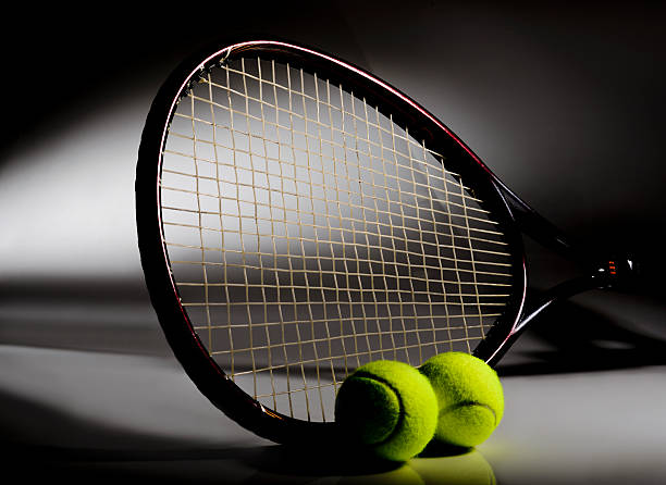 istock Dramatic view of Tennis Racket and balls 181048615