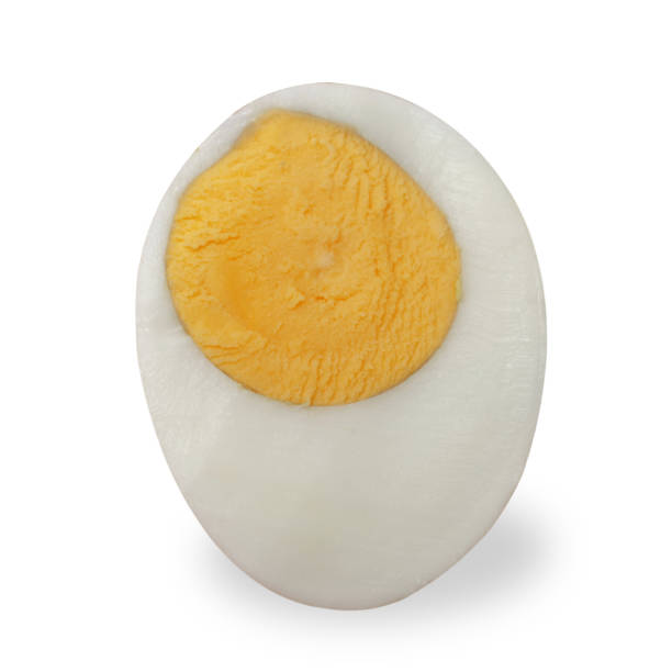 istock Hard boiled peeled chicken egg sliced in half cut out isolated 1810488863
