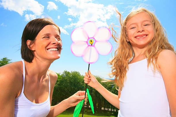 istock Mother and Daughter - Wind 181048964