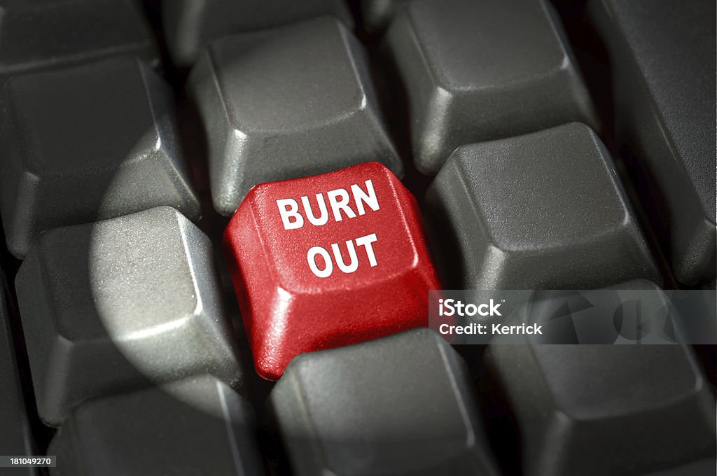 Burn-out-Konzept-Taste auf der Tastatur in Lichtstrahl - Lizenzfrei Alphabet Stock-Foto