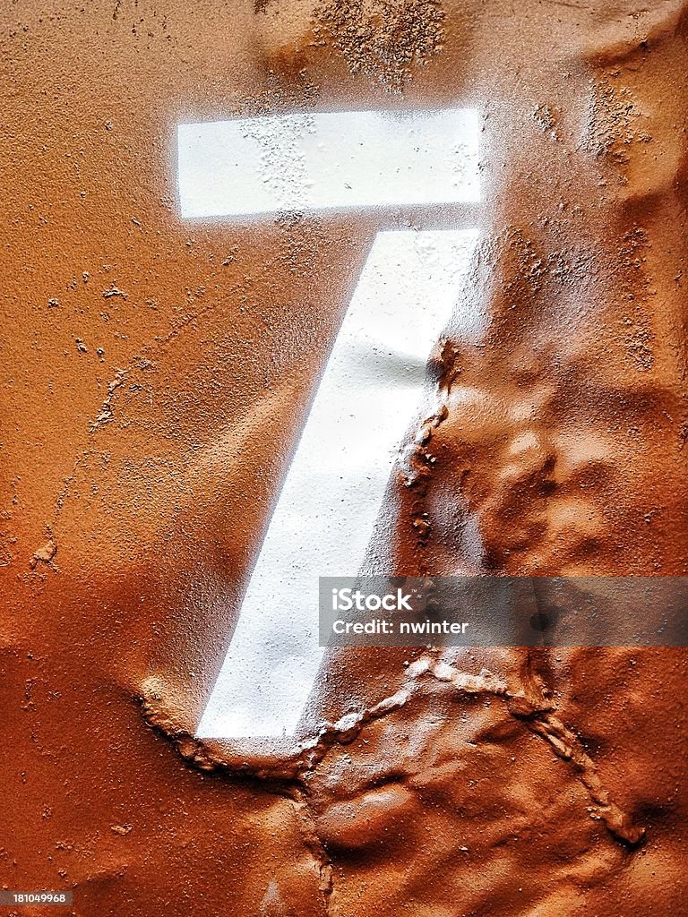 Spray dipinto numero sette - Foto stock royalty-free di Arancione