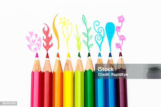 Rainbowcolored Pencil Crayons Sketch Flowers On White Surface