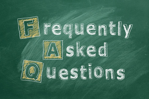 FAQ. Hand drawn text Frequently Asked Questions on greenboard