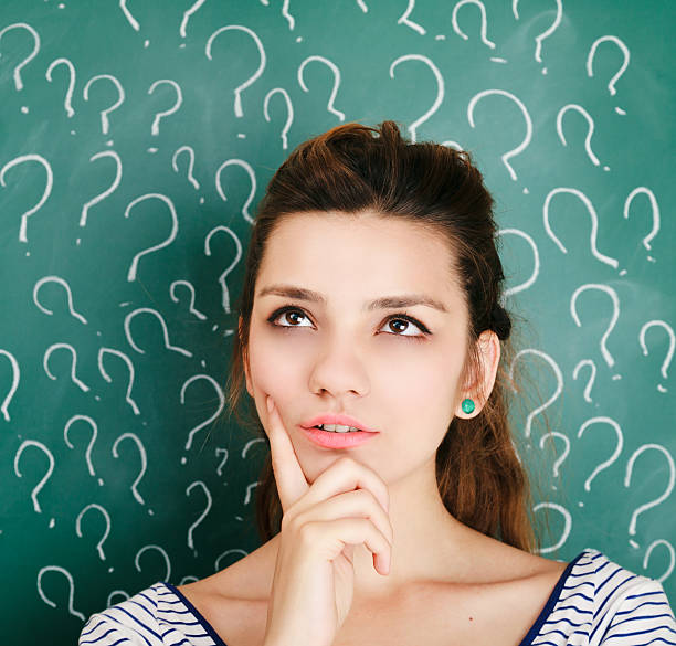istock Beautiful young woman thinking 181050859