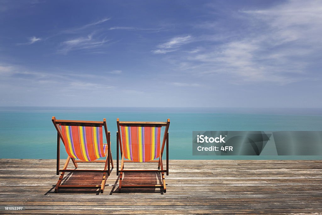 Liegestühle, Zeit zum Entspannen - Lizenzfrei Holzterrasse Stock-Foto