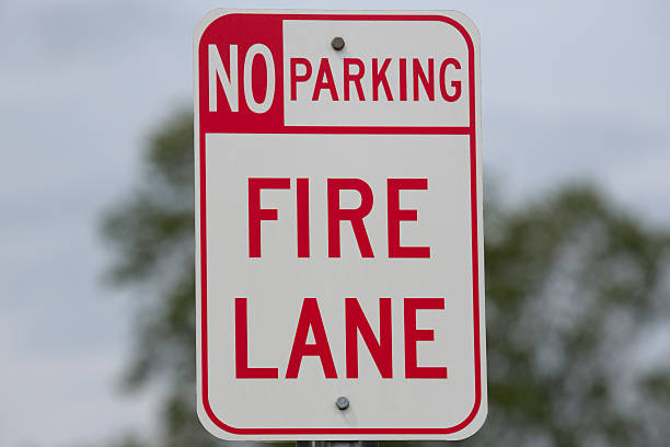 istock No Parking Fire Lane Sign Close Up Horizontal 181052536