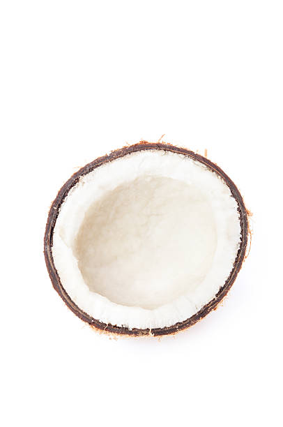 istock Coconut Cut in Half Exposing Flesh on White Background 181052771