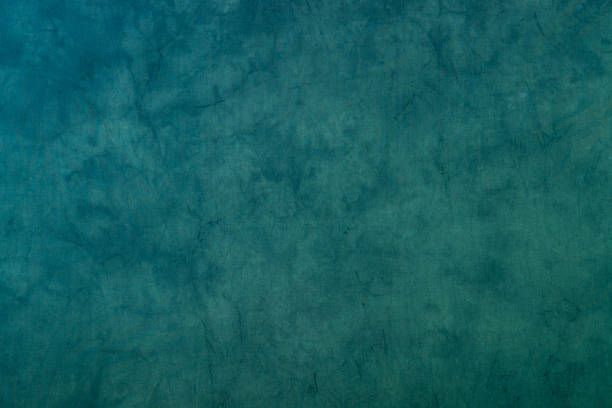istock Blue green dyed muslin background. 181053793