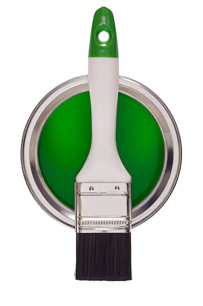 istock Paintbrush on a tin of green paint 181053829