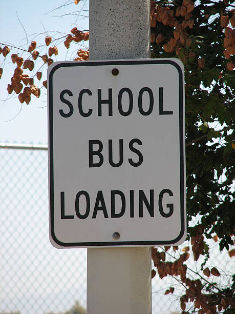 School Bus Loading stock photo