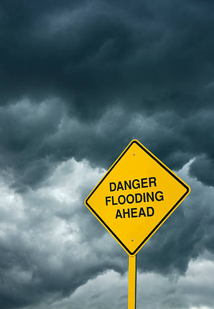 istock Flooding Ahead Road Sign 181054760