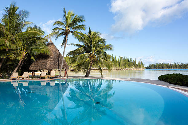 istock Infinity Pool at Tropical Resort on Perfect Sunny Day 181054835