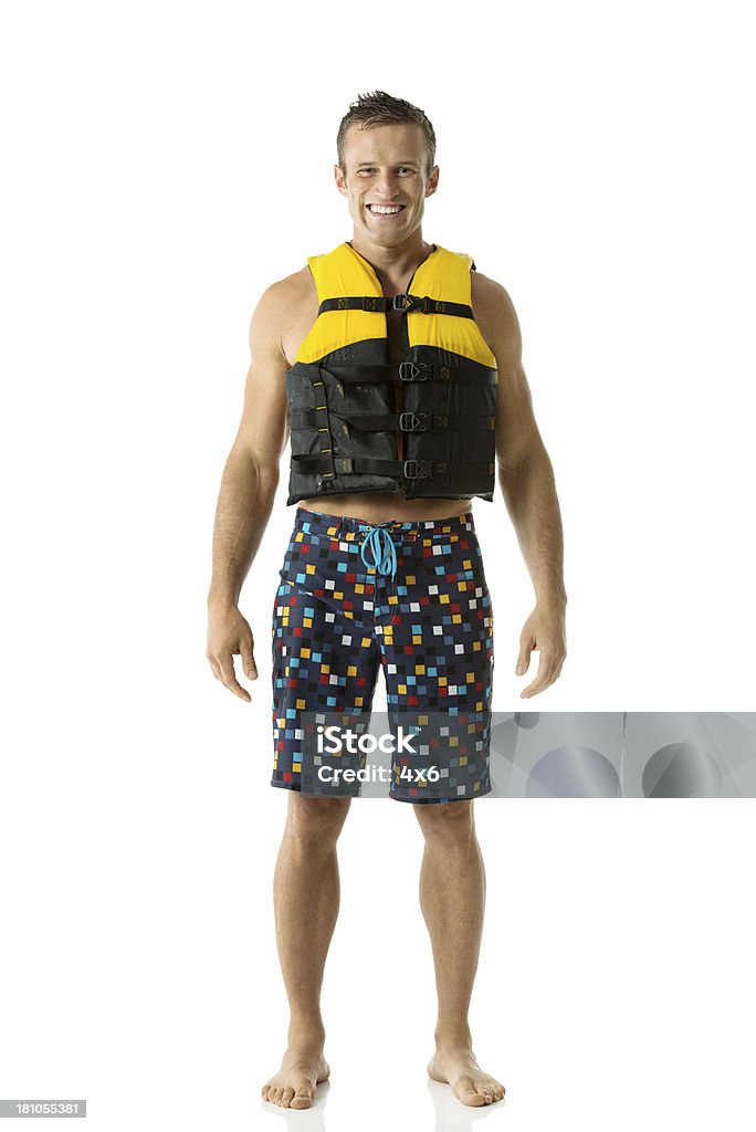 Mann trägt life jacket - Lizenzfrei Badeshorts Stock-Foto