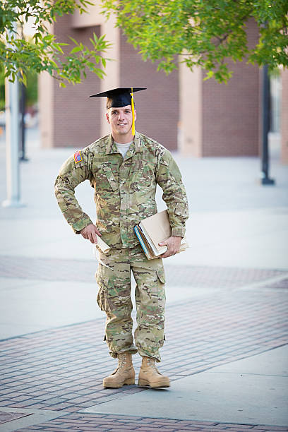 istock American Soldier with graduation hat 181056507