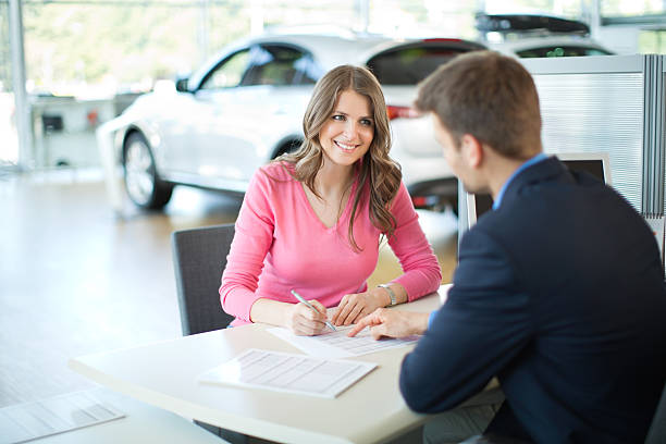 istock Woman buying car. 181056686