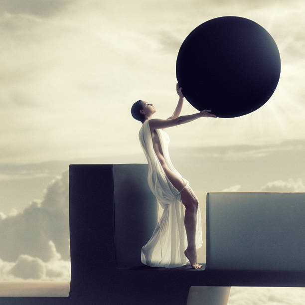 istock Goddess woman holding moon over sun making a solar eclipse  181058424