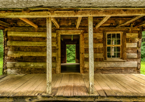 A close-up look at a century-old pioneer cabin in the Cades Cove section of the Great Smoky Mountains National Park.  HDR image.