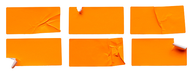 A set of orange rectangular paper sticker label isolated on white background.