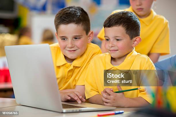 Schoolboys With Laptop Stock Photo - Download Image Now - 4-5 Years, 6-7 Years, Back to School