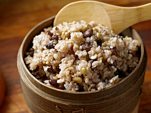 Brown Rice Brown Rice Cooked with Beans. photographty stock pictures, royalty-free photos & images