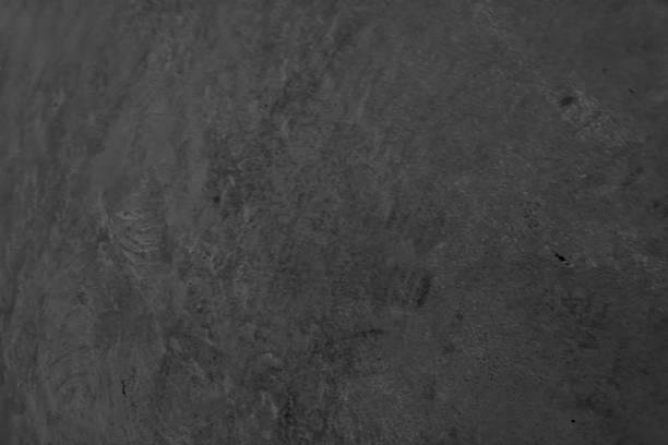 istock Granite stone nature granitoids rough honed surface finished wall, floor material black and gray color background, Always has a tight texture, durable 1810592844