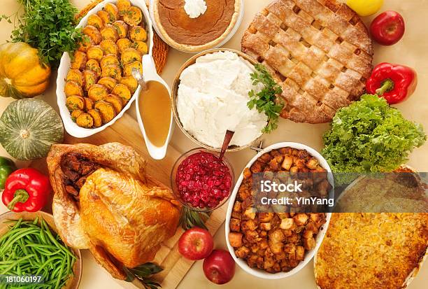 Complete Thanksgiving Dinner With Turkey Stuffing And Trimmings Overhead View Stock Photo - Download Image Now