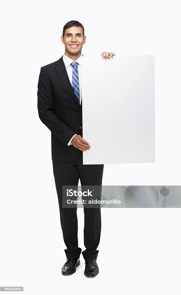 Uomo d'affari tenendo un cartello - Foto stock royalty-free di Adulto