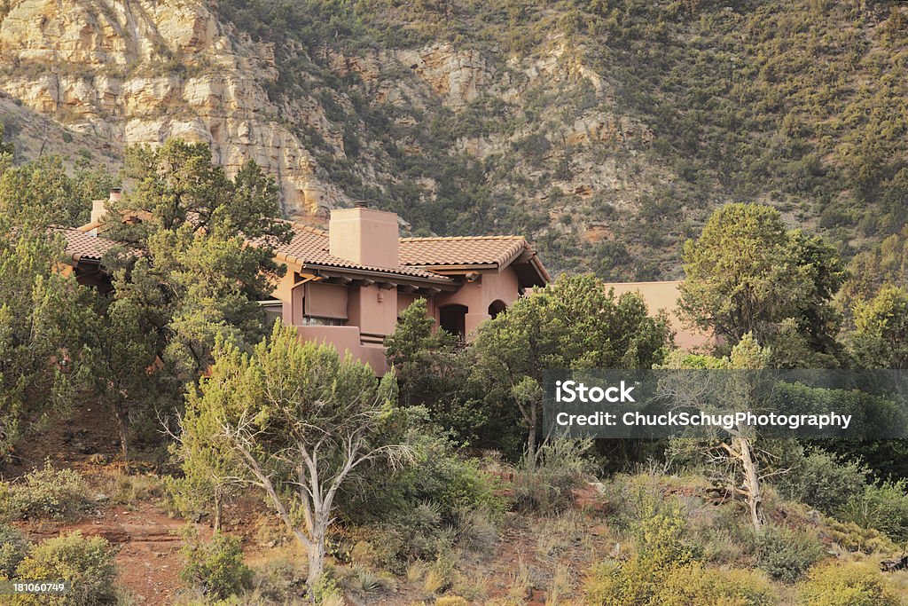 Villa Mansion Home Wilderness Landscape Beautiful Southwest mansion villa getaway in high desert setting on mesa-canyon-valley side.  Pine Valley, Arizona, 2013. Alcove Stock Photo