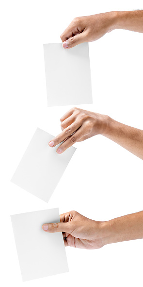 Set of human hand holding ballot paper for election vote isolated over white background. Election concept