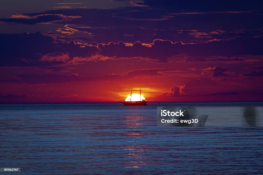 Sunset at Baltic sea Medieval Tourist Boat in Baltic cruise in sunsetSee more ON THE BEACH images here: Caravel Stock Photo