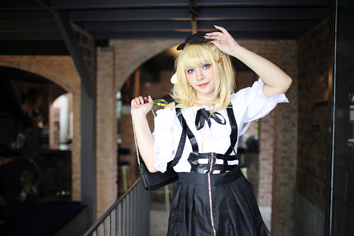 Portrait of a beautiful young woman game Cosplay with blonde hair