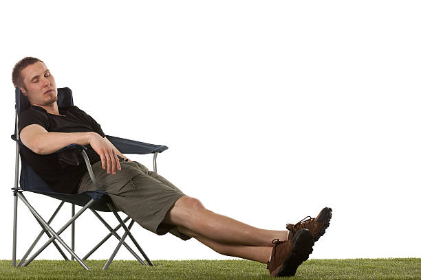 istock Man relaxing in a chair 181063306